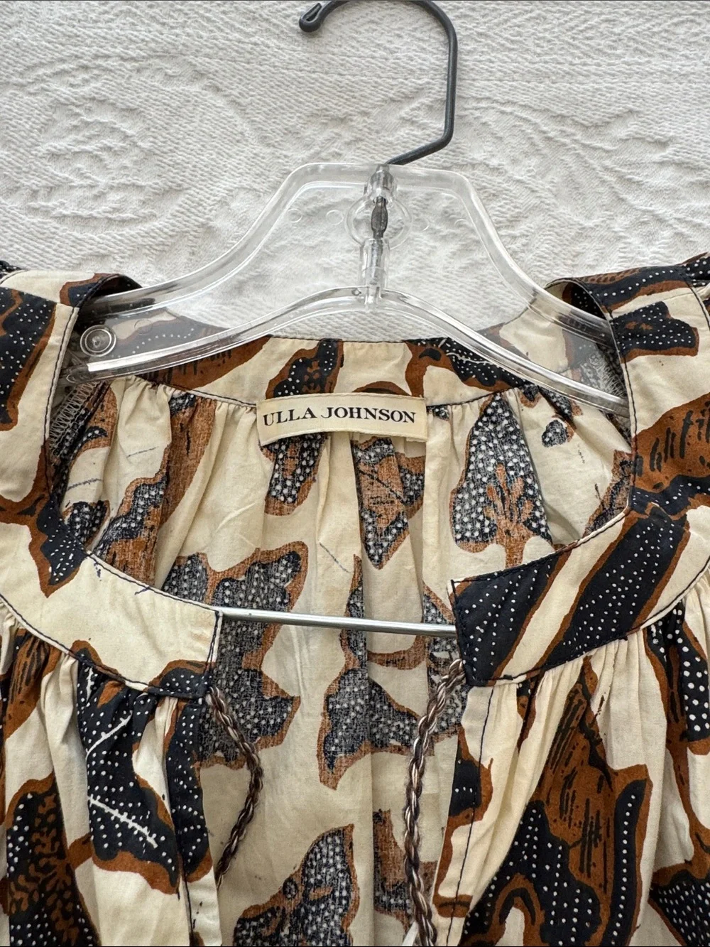 Ulla Johnson Women’s Puff Sleeve Floral Peasant Top in Cream and Brown.
